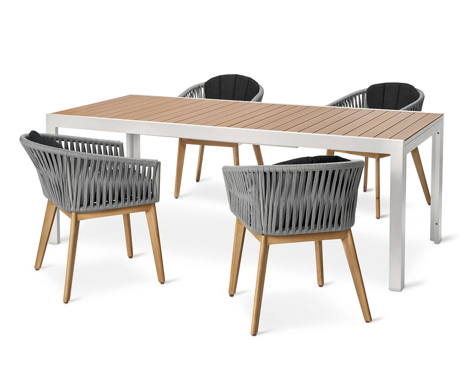 Vier Dining-Sessel mit Textilgeflecht stehen um einen Ausziehtisch »Liska« aus leichtem Aluminium.