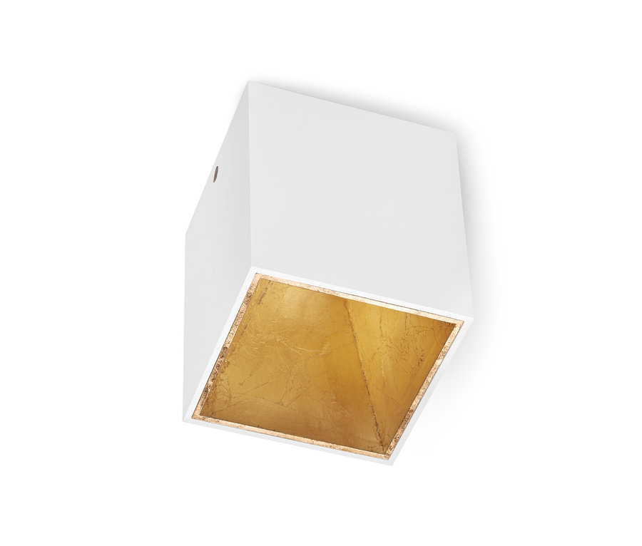 Eine weiße LED-Deckenleuchte mit goldener Innenseite.