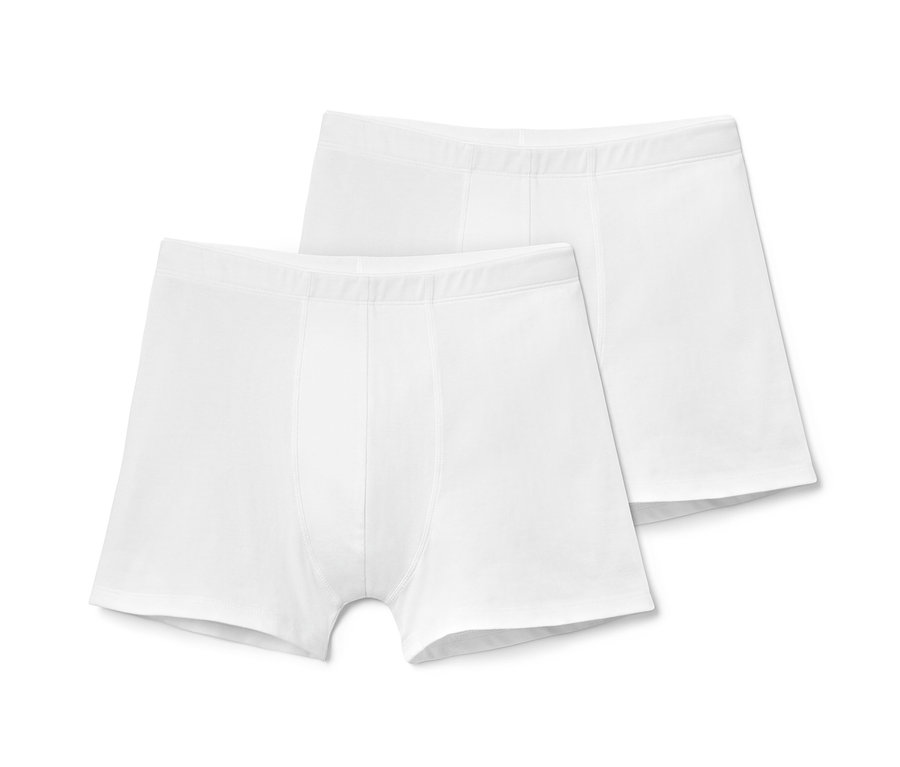 Zwei weiße Slipboxer mit COOLMAX® liegen nebeneinander.