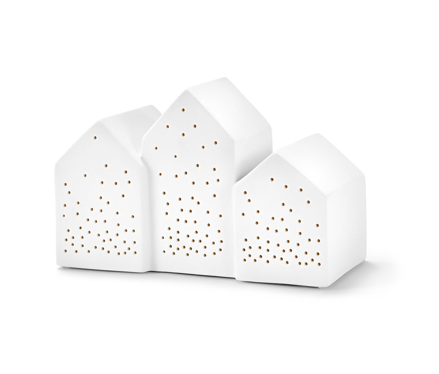 Weißes LED-Dörfchen mit kleinen Löchern.