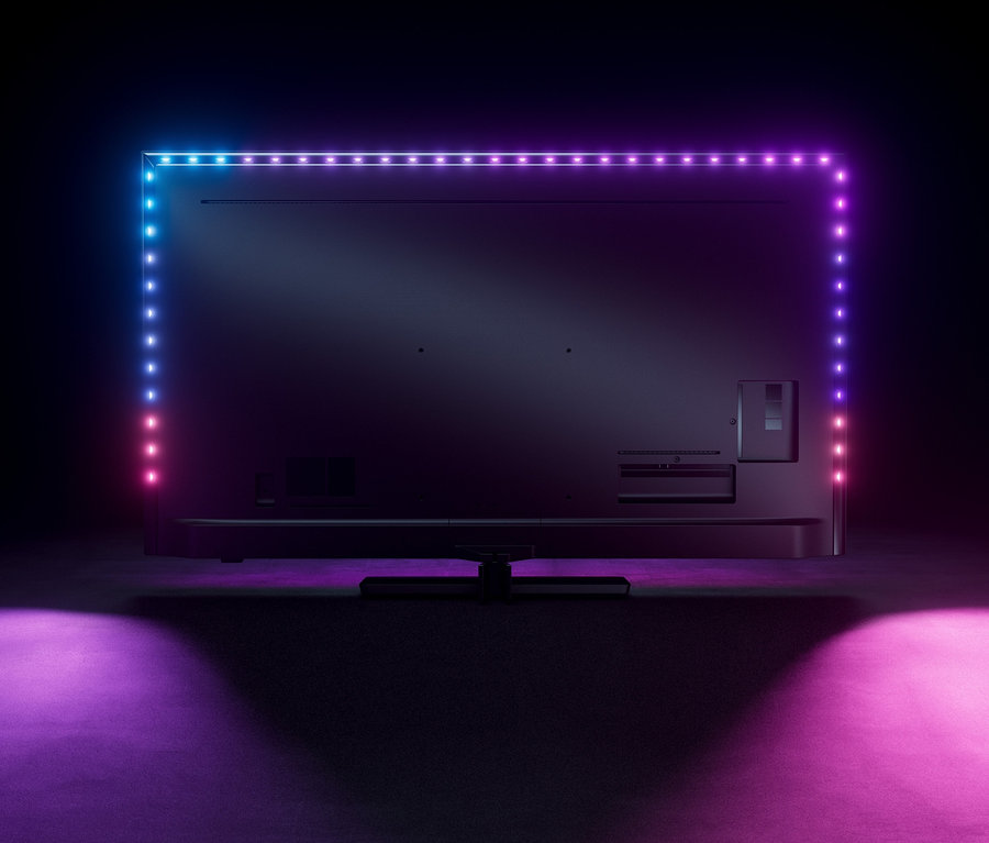 Detailansicht der Rückseite eines The One Philips 4K UHD Ambilight Fernsehers mit Google TV »65 PUS 8808/12« mit Umgebungsbeleuchtung.