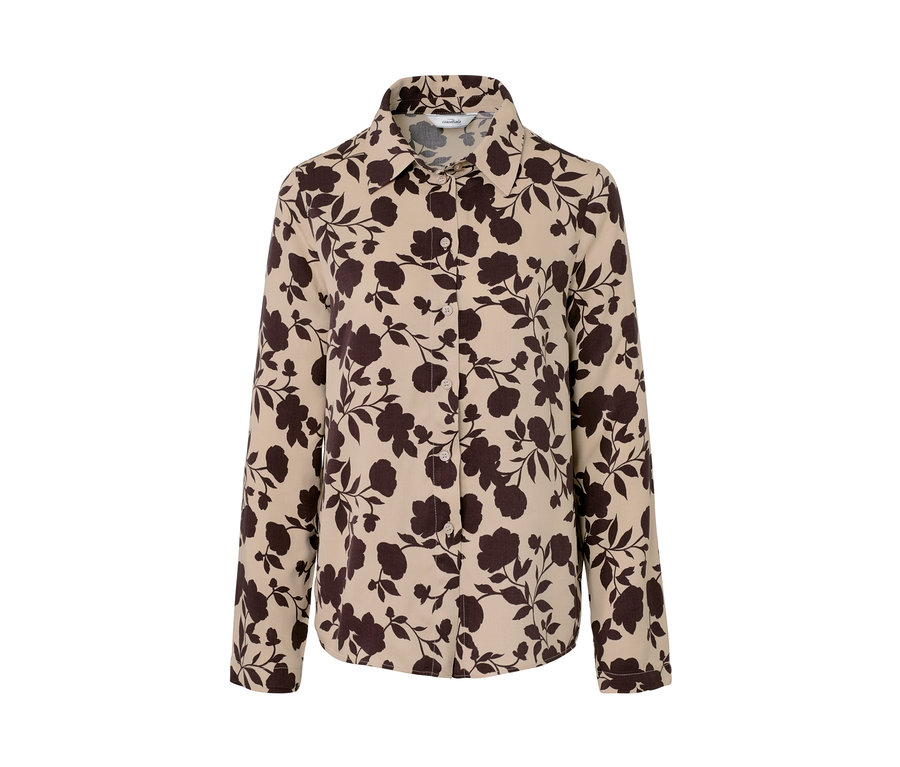 Eine Hemdbluse mit Alloverprint aus braunen Blumen auf beige Hintergrund.