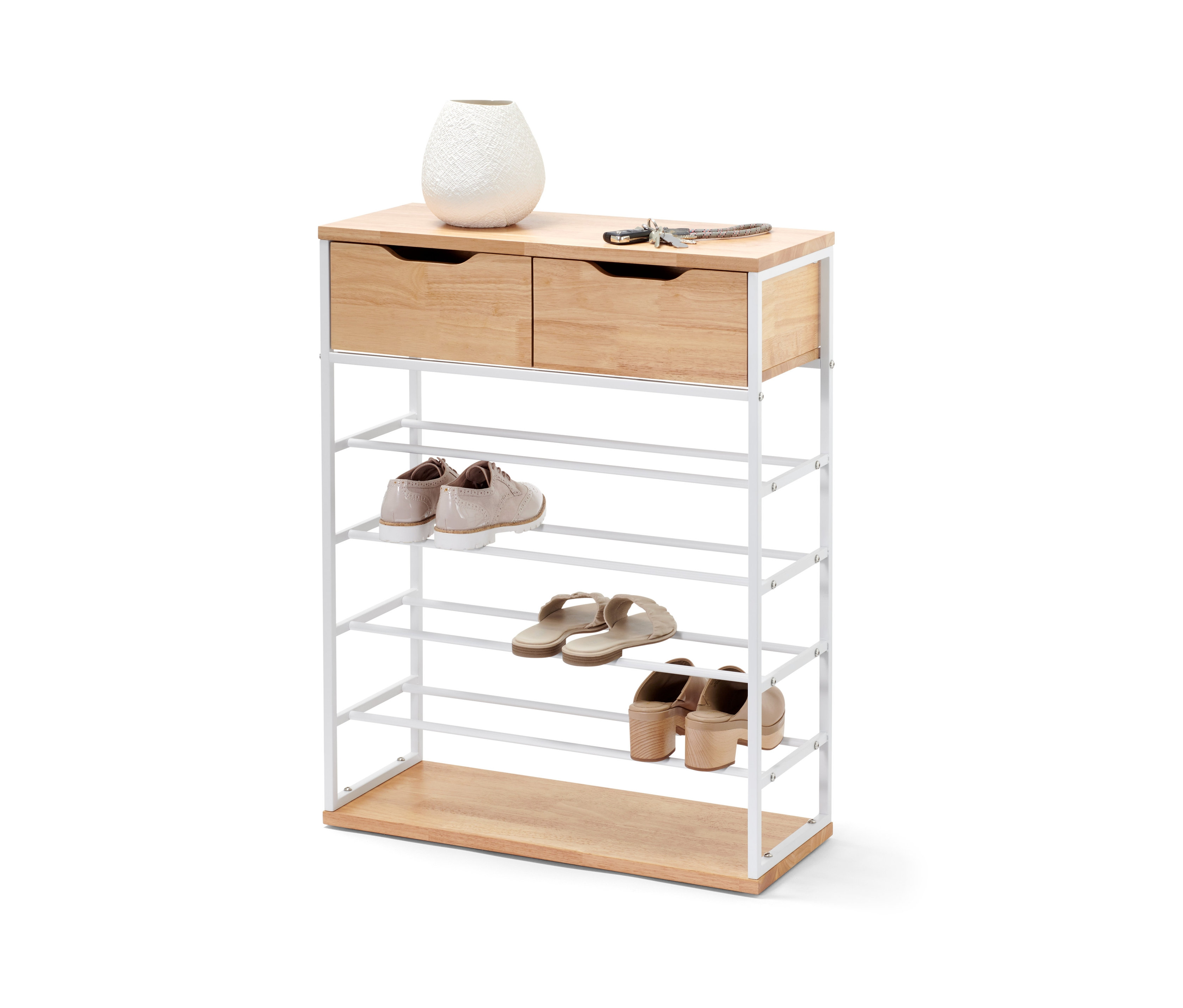 Schuhregal mit Schubladen, Vase und Schlüssel oben, drei Schuhpaare in den Regalen.