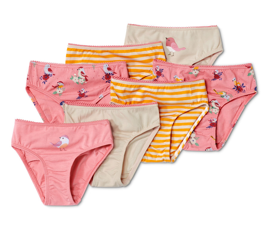 Sieben Mädchenslips in verschiedenen Farben und Mustern, darunter Streifen und Vogelprints.
