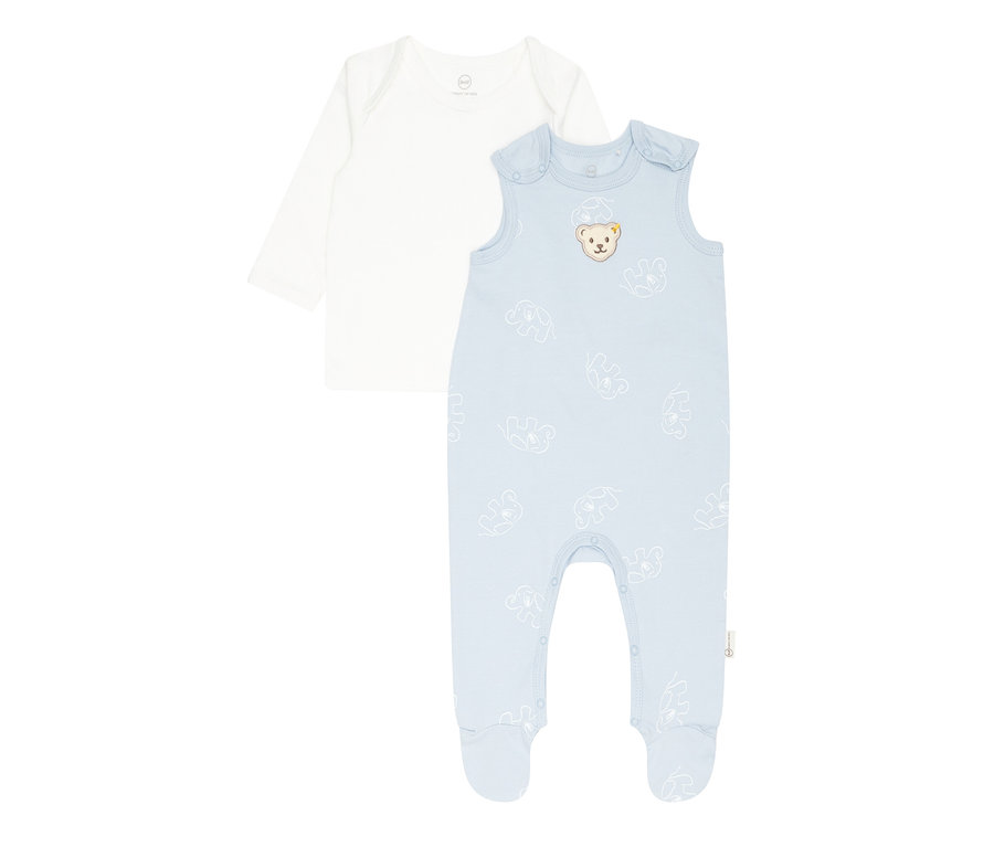 Zwei Kleidungsstücke für Babys: ein weißes, langärmeliges Shirt und ein hellblauer Strampler mit Elefantenmuster. Steiff 2 Baby-Strampler, hellblau