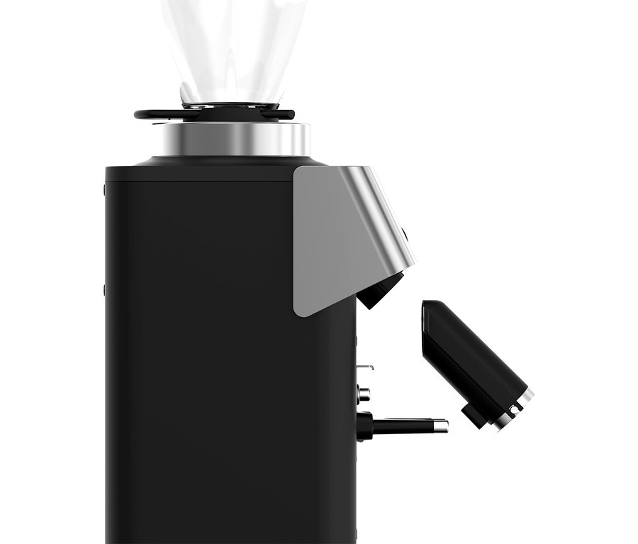 Nahaufnahme einer Kaffeemühle mit einem transparenten Behälter auf der Oberseite.