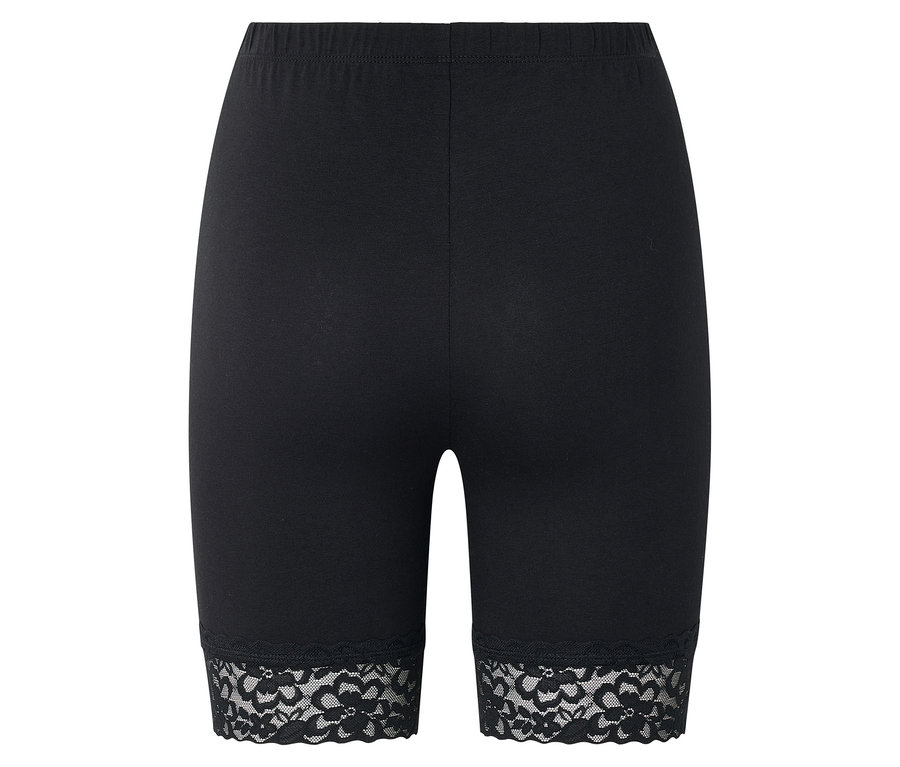 Schwarze, kurze Leggings mit elastischem Bund und Spitzenbesatz an den Beinenden.