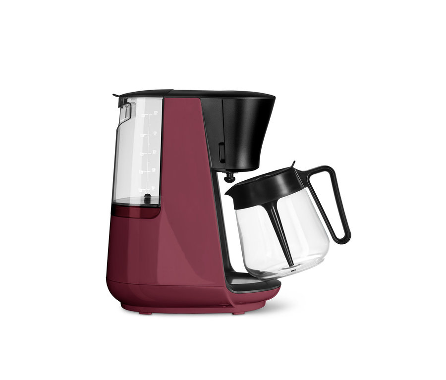Beerenfarbene »Let's Brew« Filterkaffeemaschine mit transparentem Wasserbehälter und Glaskanne.