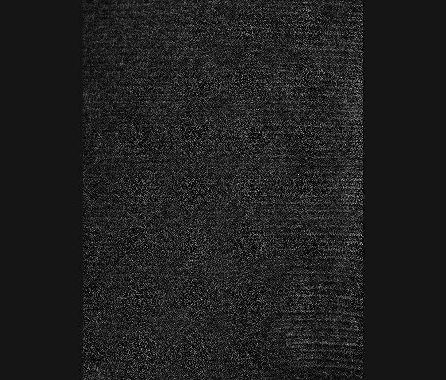 Detailaufnahme der Textur von Lederhandschuhen.
