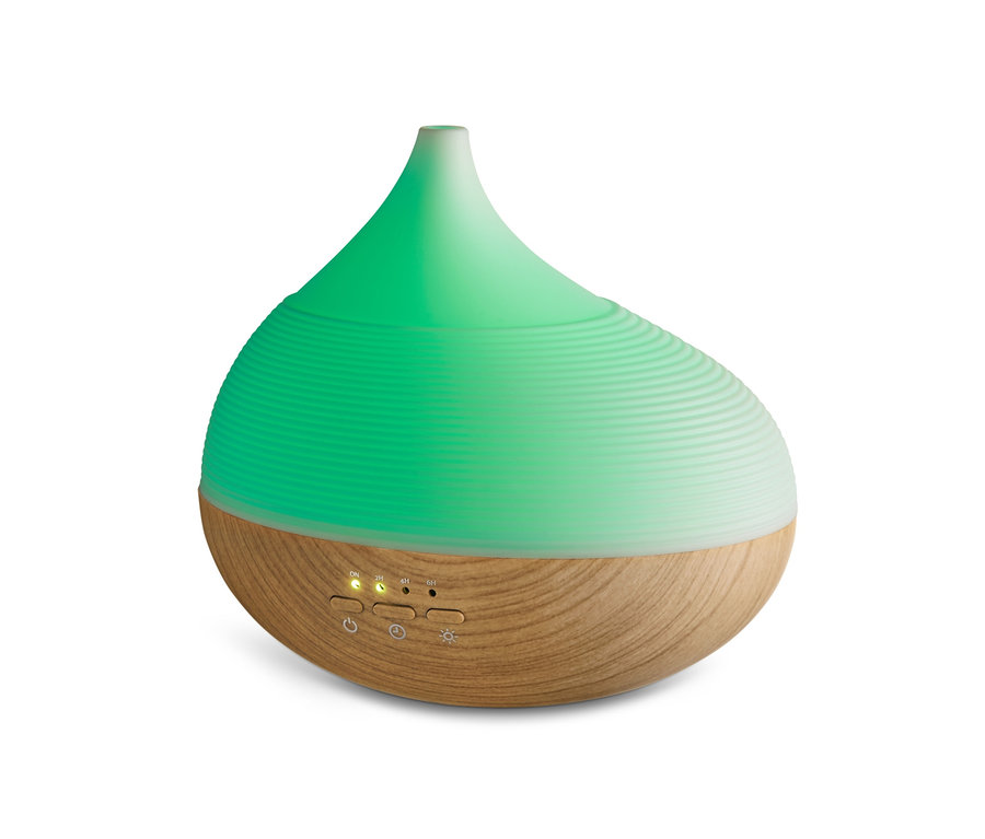 Aromadiffusor mit Wellness-Beleuchtung mit grünem Licht.