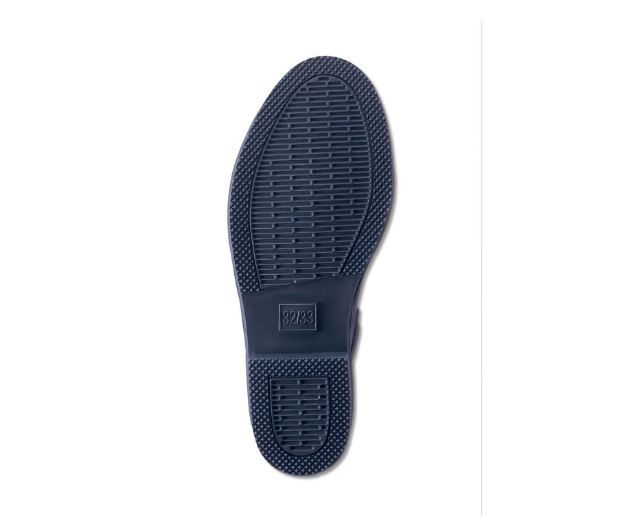 Sohle einer Regenstiefelette.