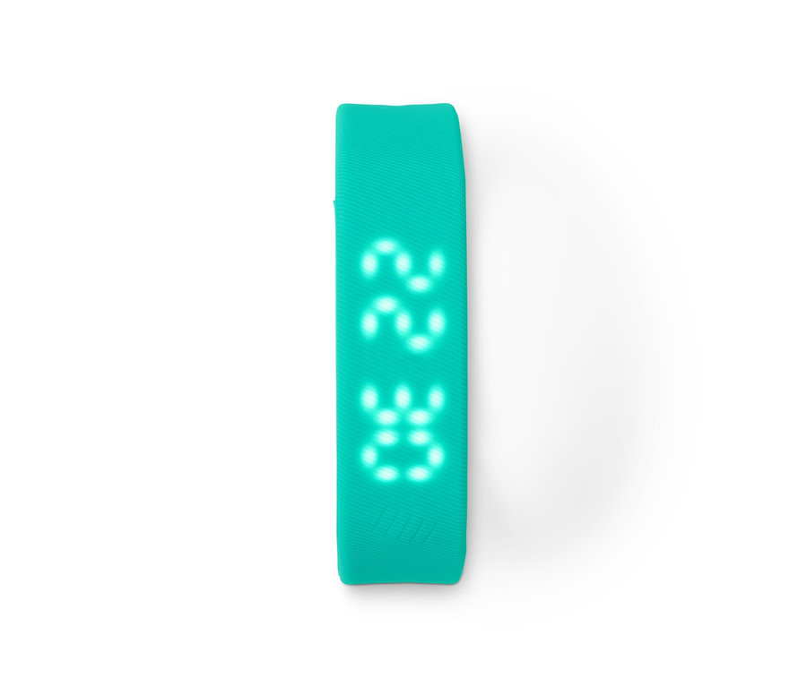 Der Schrittzähler mit Uhr hat ein grünes Armband und eine Digitalanzeige.
