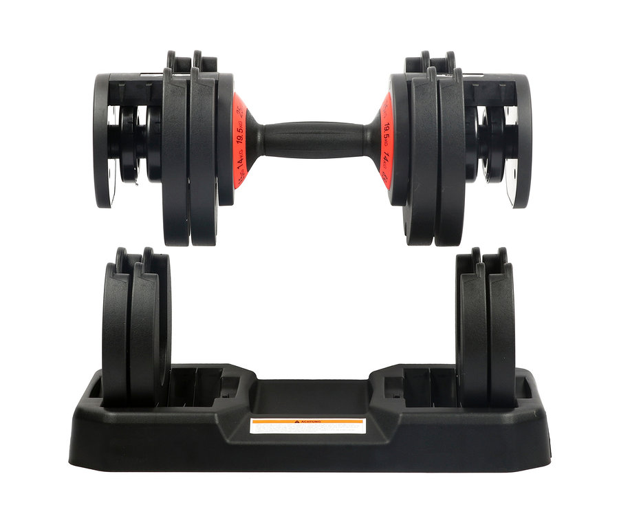 Eine schwarze, verstellbare Body Coach Hantel von 3 – 25 kg befindet sich über einer Basis.