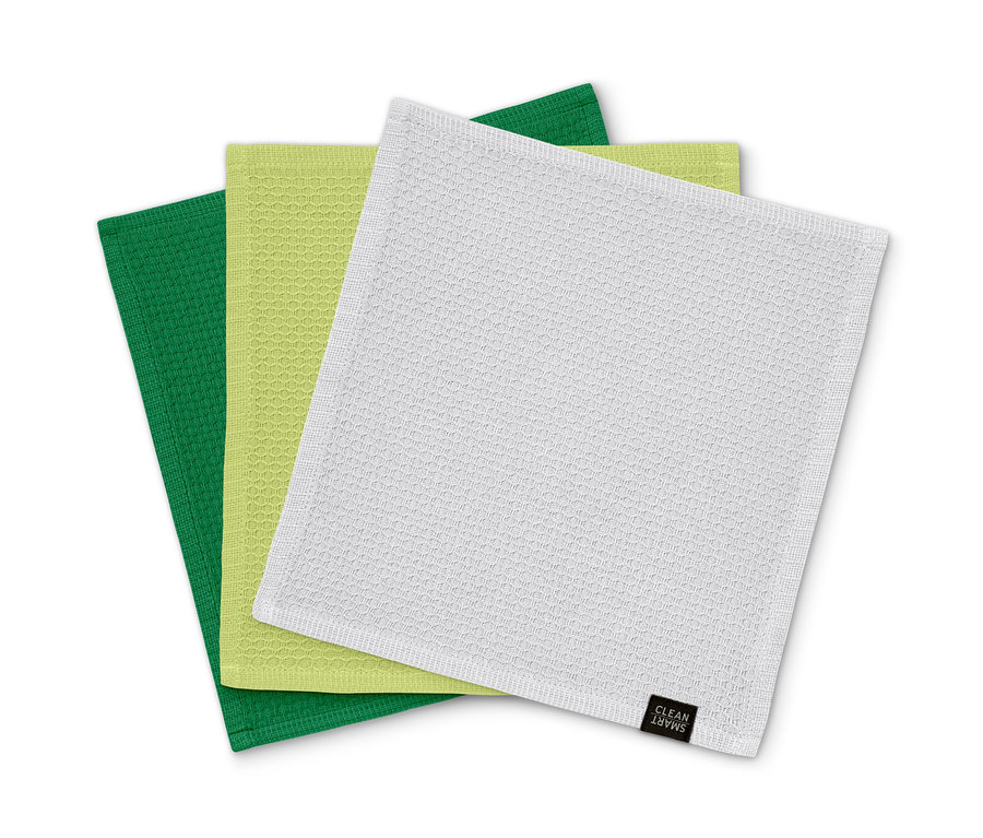 Drei Spültücher: grün, hellgrün und weiß.