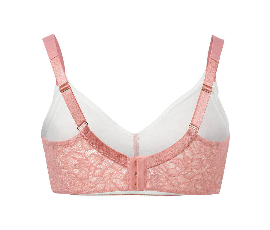 Detailaufnahme eines rosafarbenen Premium-Soft-BHs mit Spitze und weißem Netzstoff.