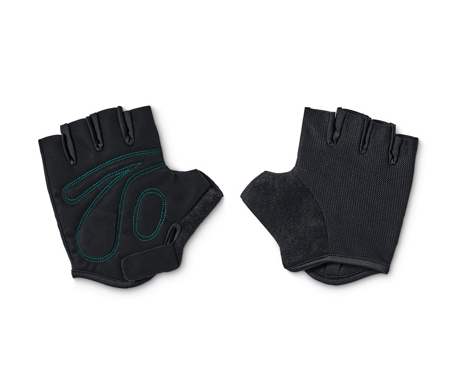 Zwei schwarze Fahrrad-Handschuhe liegen nebeneinander.