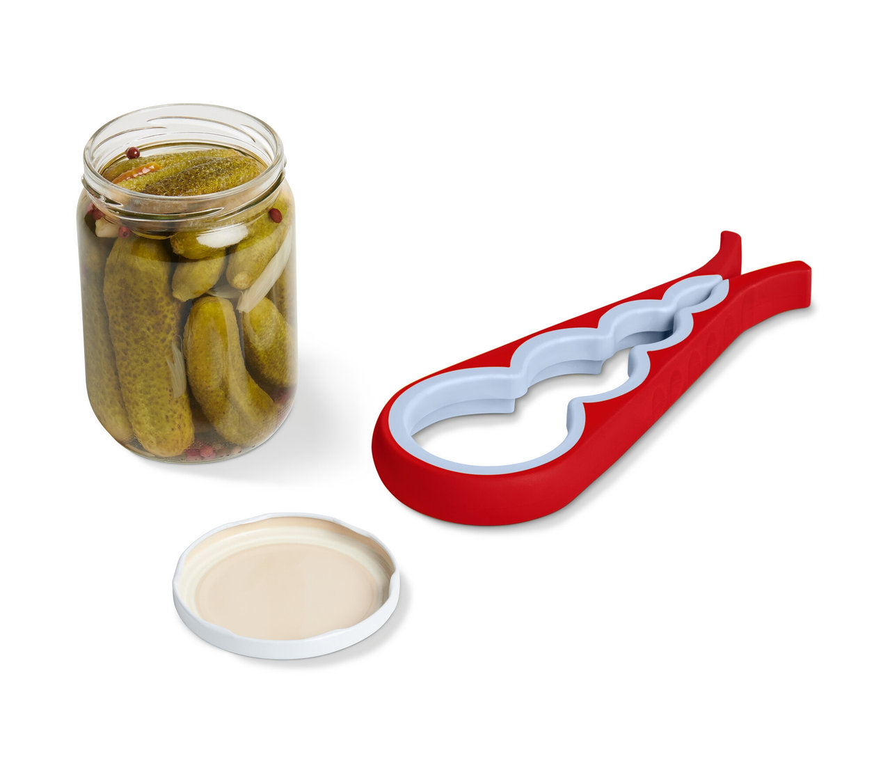 Ein Gurkenglas, ein Deckel und ein Glas-und-Flaschenöffner liegen nebeneinander.