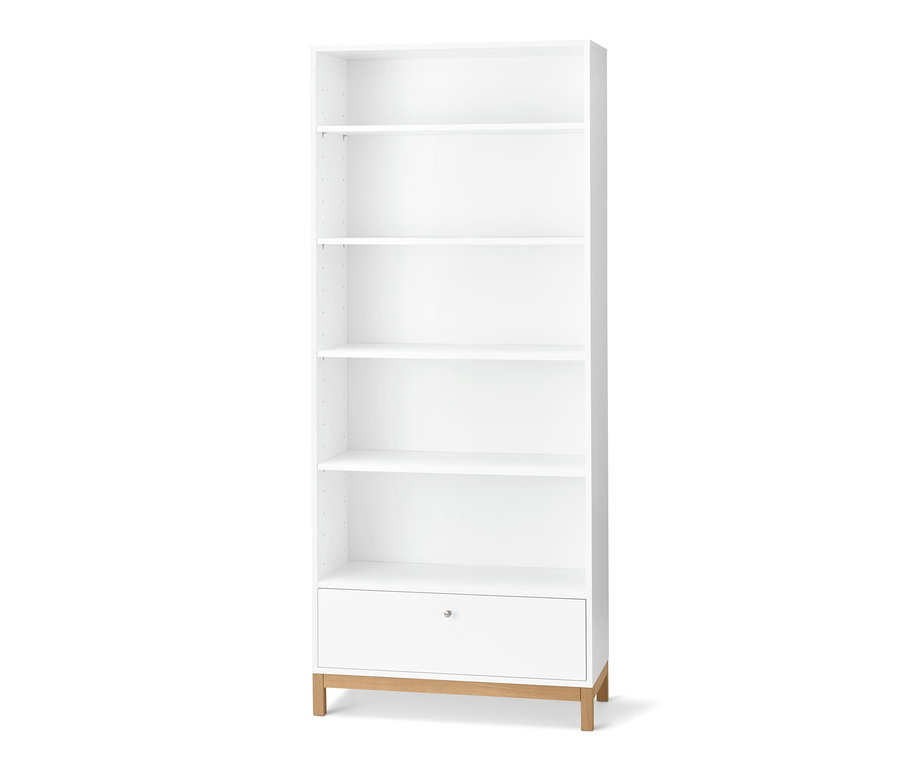 Ein hohes, weißes Bücherregal mit einer Schublade.