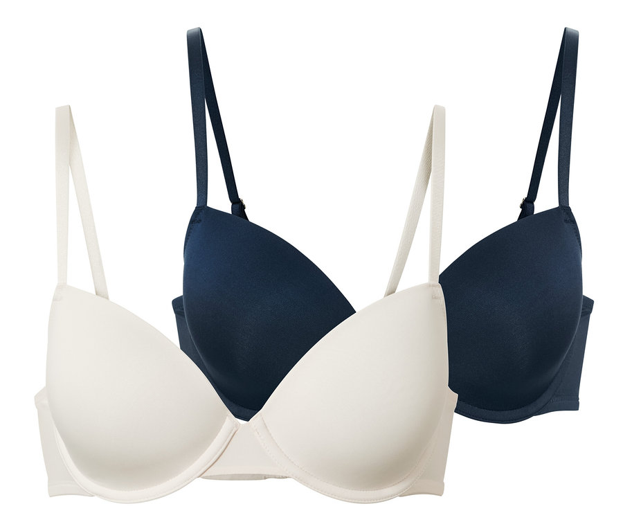 Zwei Schalen-BHs in Creme und Dunkelblau.