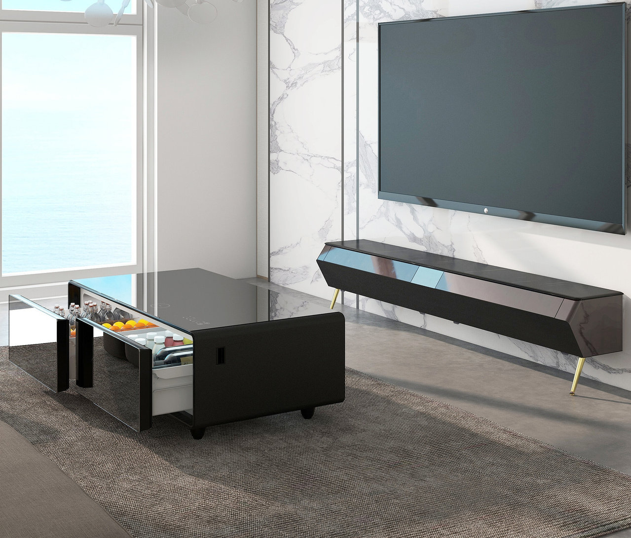 Wohnzimmer mit schwarzem Caso Sound & Cool Tisch mit Getränken und Obst, TV und Lowboard.