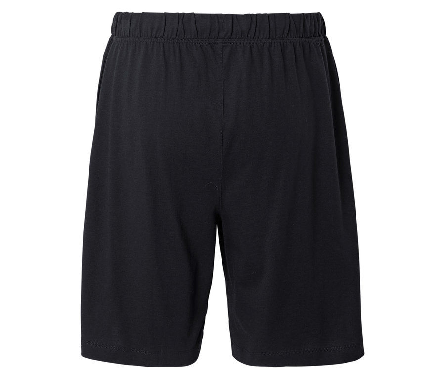 Schwarze Shorts mit elastischem Bund, von hinten fotografiert.