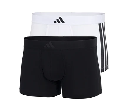 Zwei adidas Active Flex Cotton Slipboxer in Schwarz und Weiß, der schwarze im Vordergrund, der weiße mit drei Streifen an der Seite.