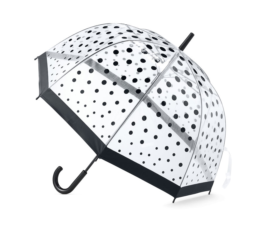Ein durchsichtiger Regenschirm mit schwarzen Punkten.