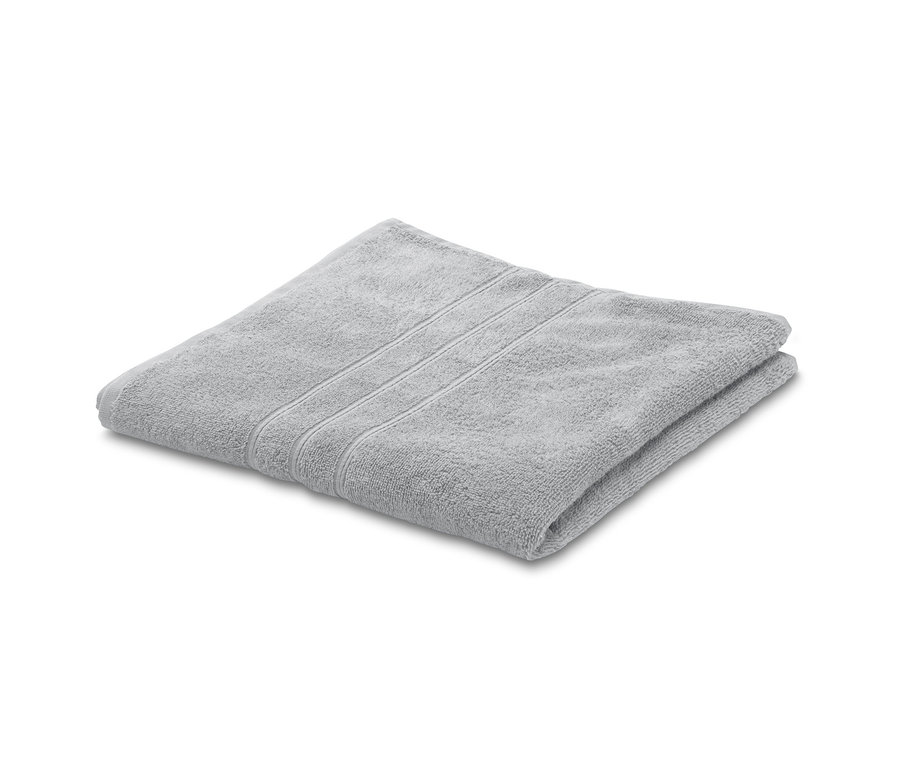 Gefaltetes Frottier-Badetuch in Hellgrau.