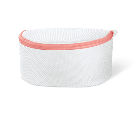 Ein weisses BH-Wäschenetz mit einem pinken Reissverschluss.