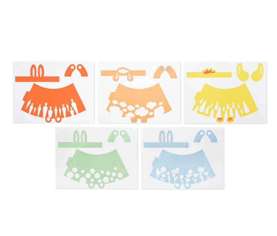 Fünf Blätter mit Teilen für ein Oster-Bastel-Set. Jedes Blatt enthält einen Rock, Ohren und Pfoten eines Hasen in Orange, Pfirsich, Gelb, Grün und Blau.