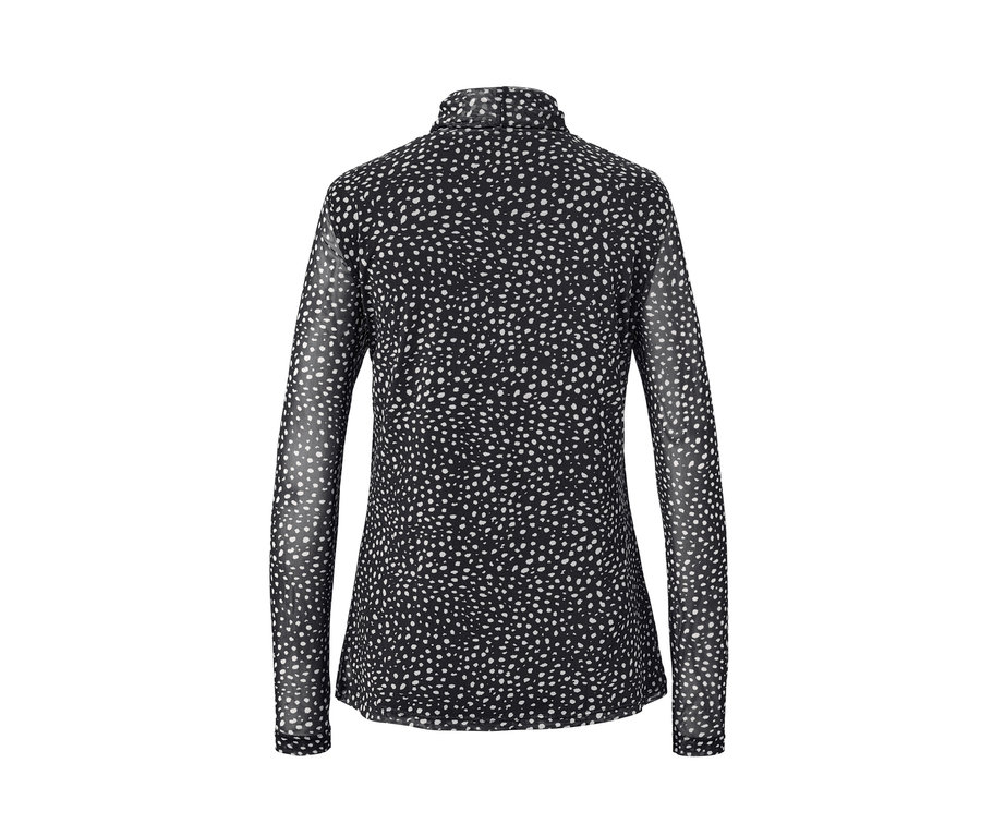 Detailansicht eines gepunkteten Mesh-Rollkragenshirts für Damen.