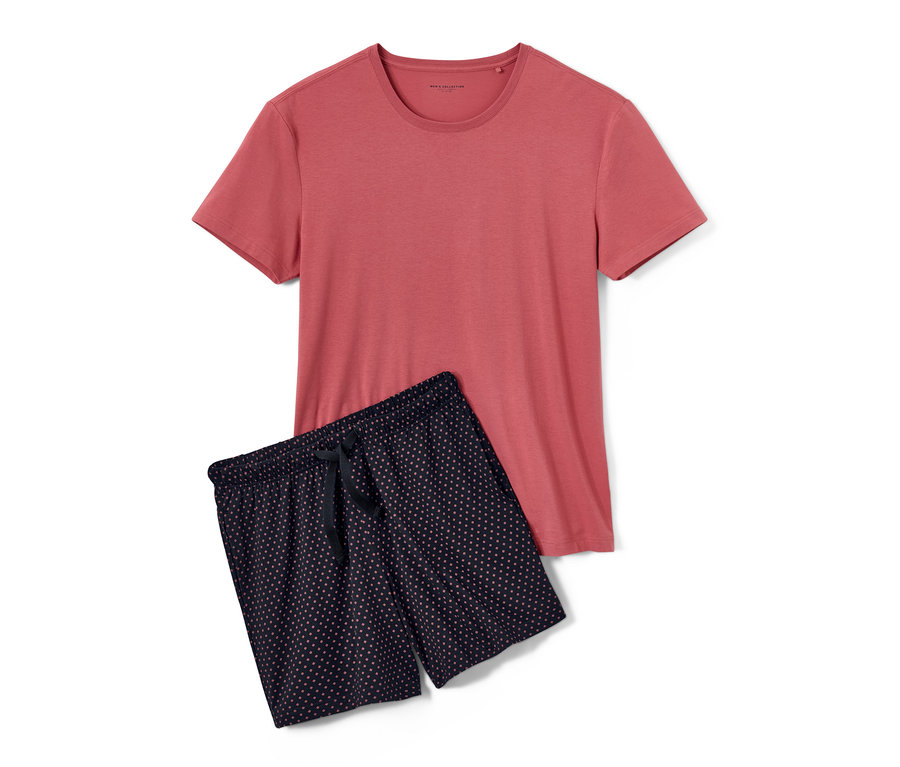 Shorty-Pyjama mit Modal: korallfarbenes T-Shirt und dunkelblaue, gepunktete Shorts.