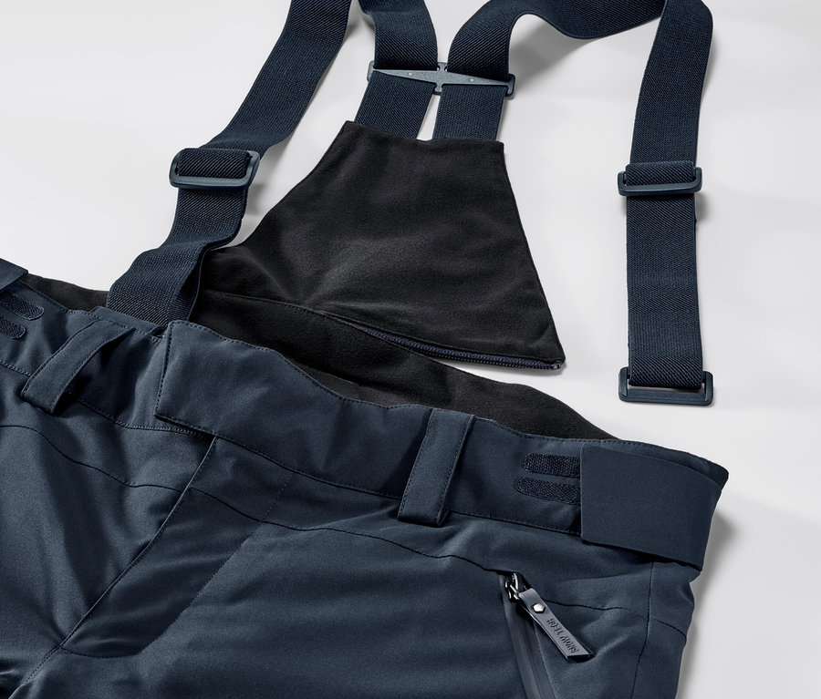 Blaue High-Tech-Skihose mit Latz und verstellbaren Trägern.