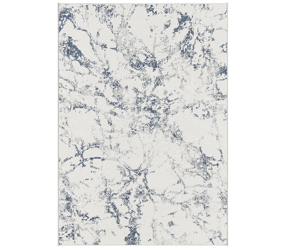 Detailaufnahme eines »Skyline« Teppichs in Marmor.