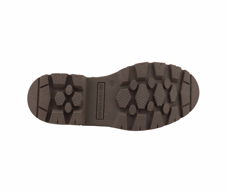 Braune Tom Tailor Schuhsohle mit grobem Profil.