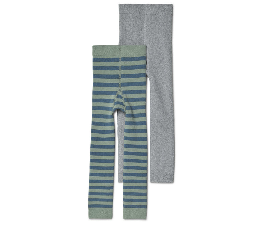 Zwei Leggings liegen nebeneinander, eine grau und eine grün-blau gestreift.