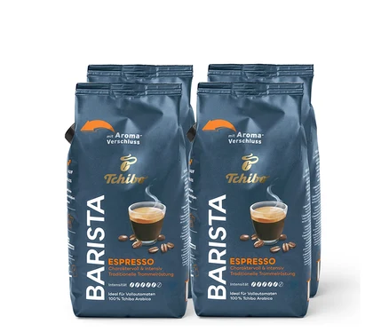 Vier Packungen Tchibo Barista Espresso Kaffee. Die Packungen sind dunkelblau mit einem Bild einer Tasse Espresso.