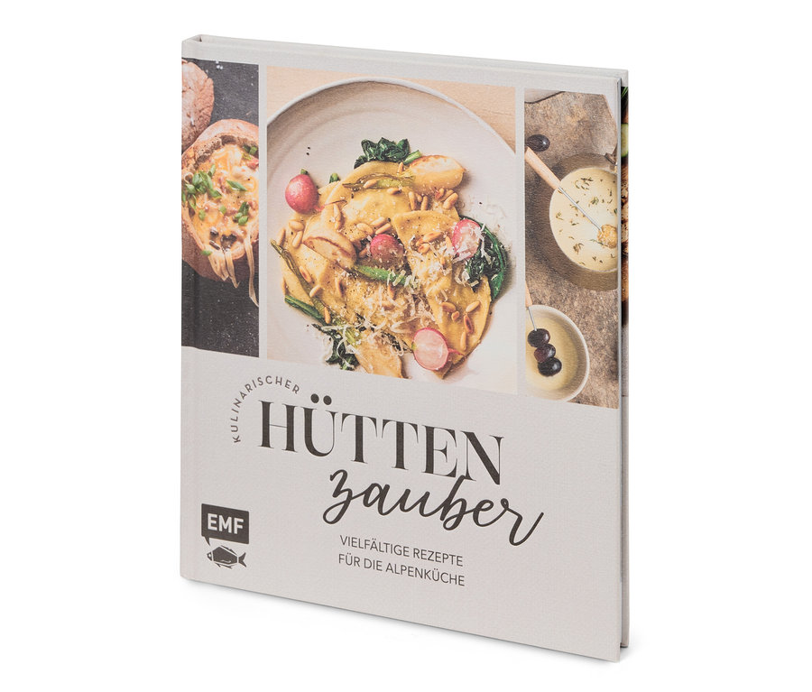 Nahaufnahme eines Kochbuchs namens Hüttenzauber mit Essensbildern.