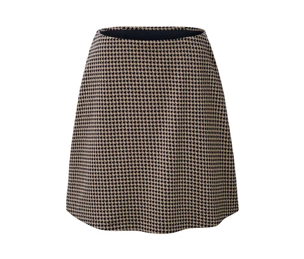 Detailansicht eines Sweatrocks mit Hahnentritt-Jacquardmuster.