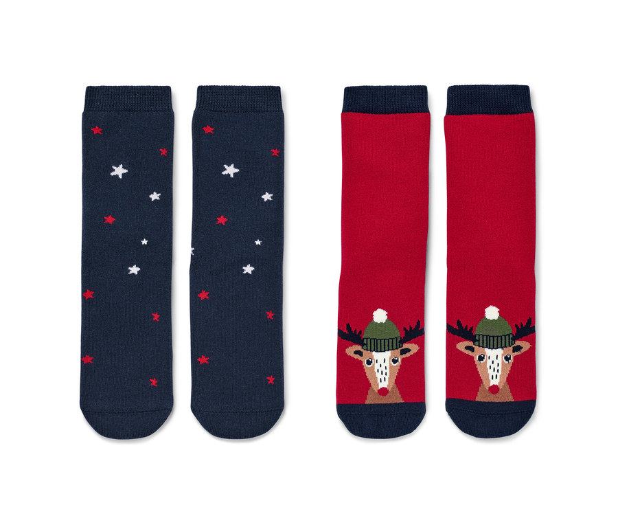 Zwei Paar Kleinkind-Antirutsch-Socken mit Rentier-Motiv.