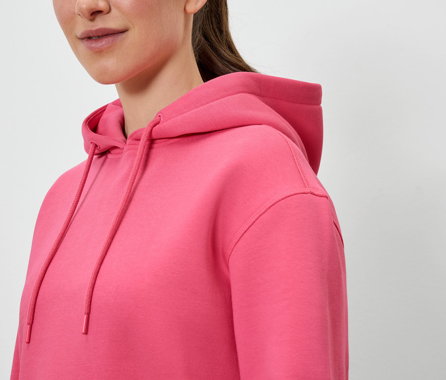 Detailansicht eines rosafarbenen Damen-Hoodies.