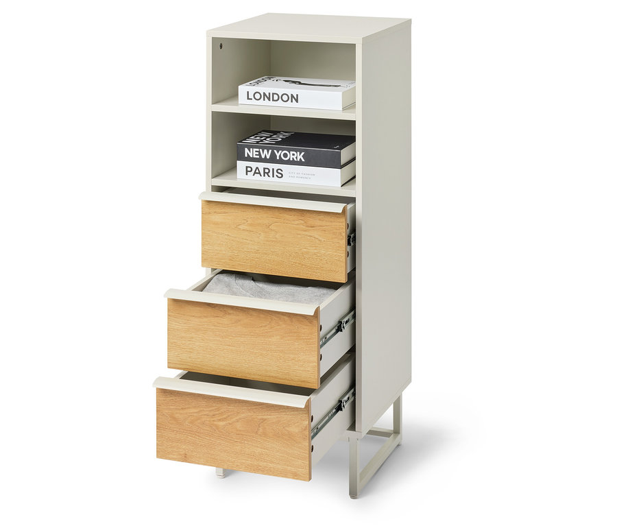 Schubladenturm »LEEG« mit 3 Schubladen, wobei eine Schublade teilweise geöffnet ist und Bücher oben liegen.