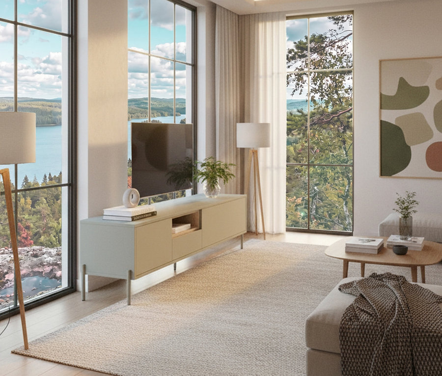 Wohnzimmer mit Fernseher auf einem salbeigrünem Lowboard "Hygge" vor einem Fenster mit Seeblick.