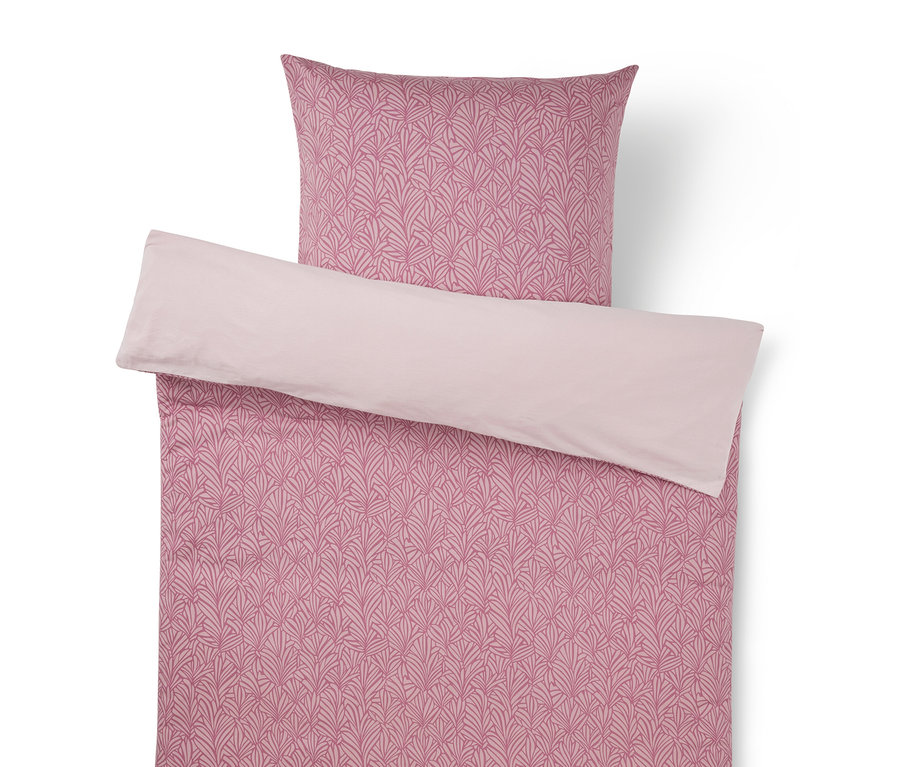 Rosa Bettwäsche-Set mit Blättermuster und hellrosa Umschlag.