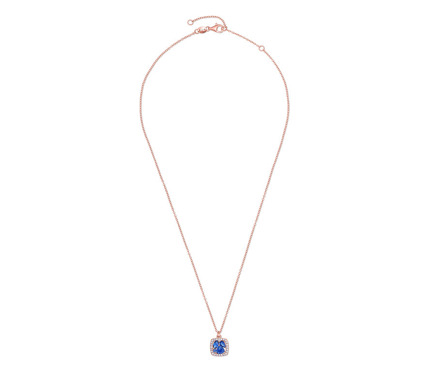 Halskette mit roségoldener Kette und blauem Anhänger.