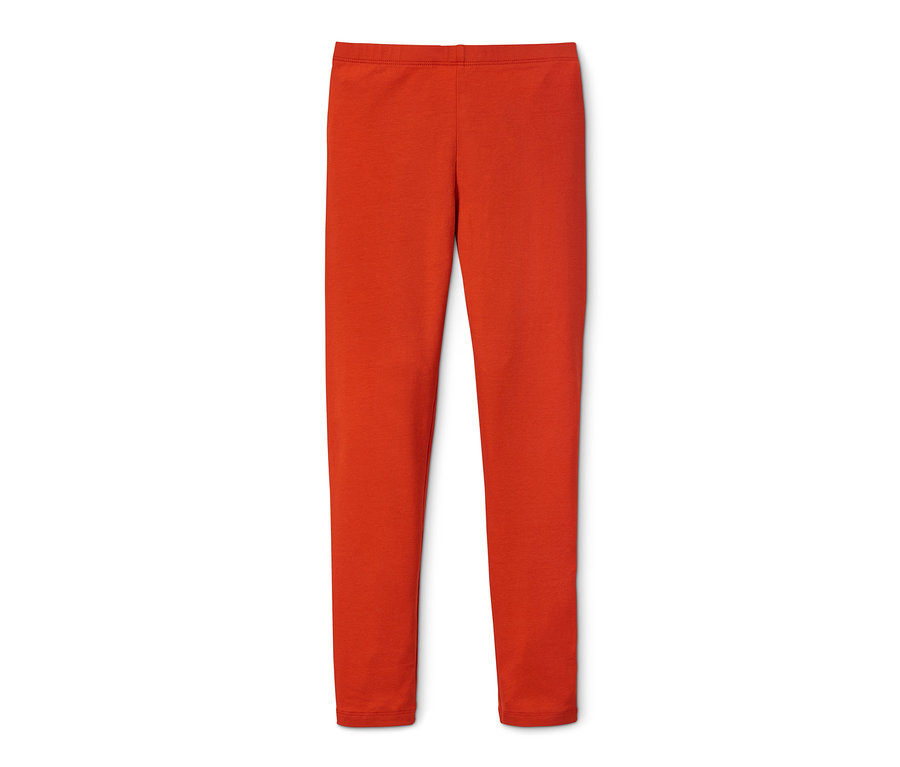 Eine orangefarbene Leggings aus Bio-Baumwolle auf weißem Hintergrund.
