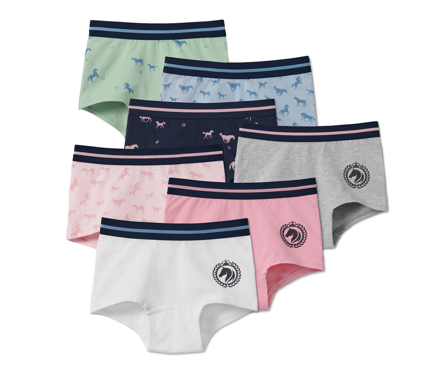 Sieben Pantys aus Bio-Baumwolle in verschiedenen Farben mit Pferdeaufdruck und Logo.