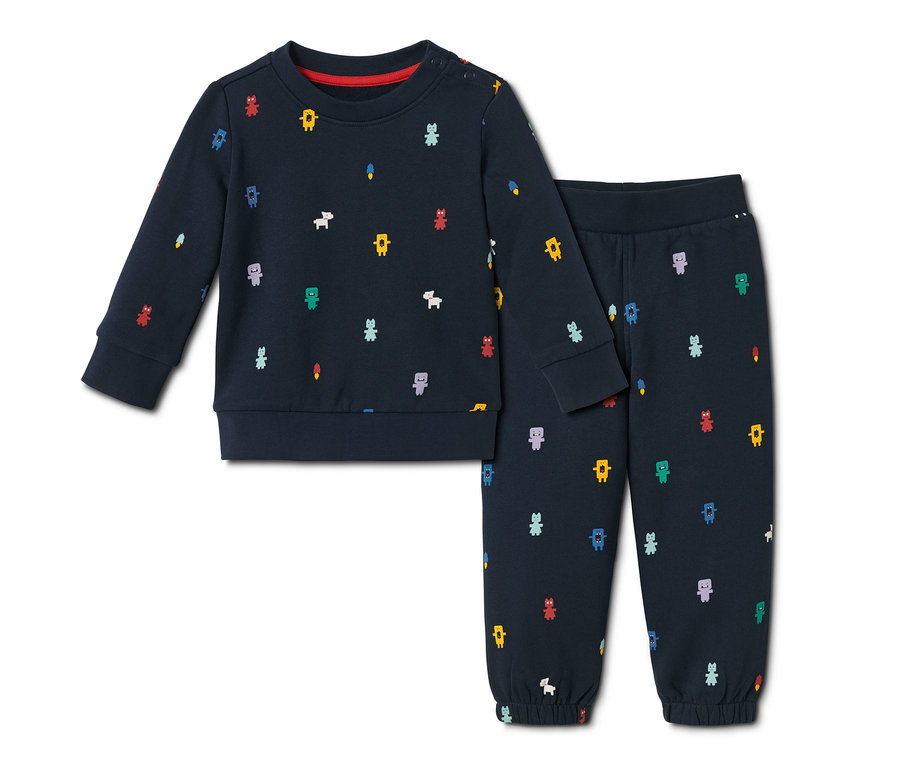 Marineblauer Sweatkombi mit bunten Comicfiguren.