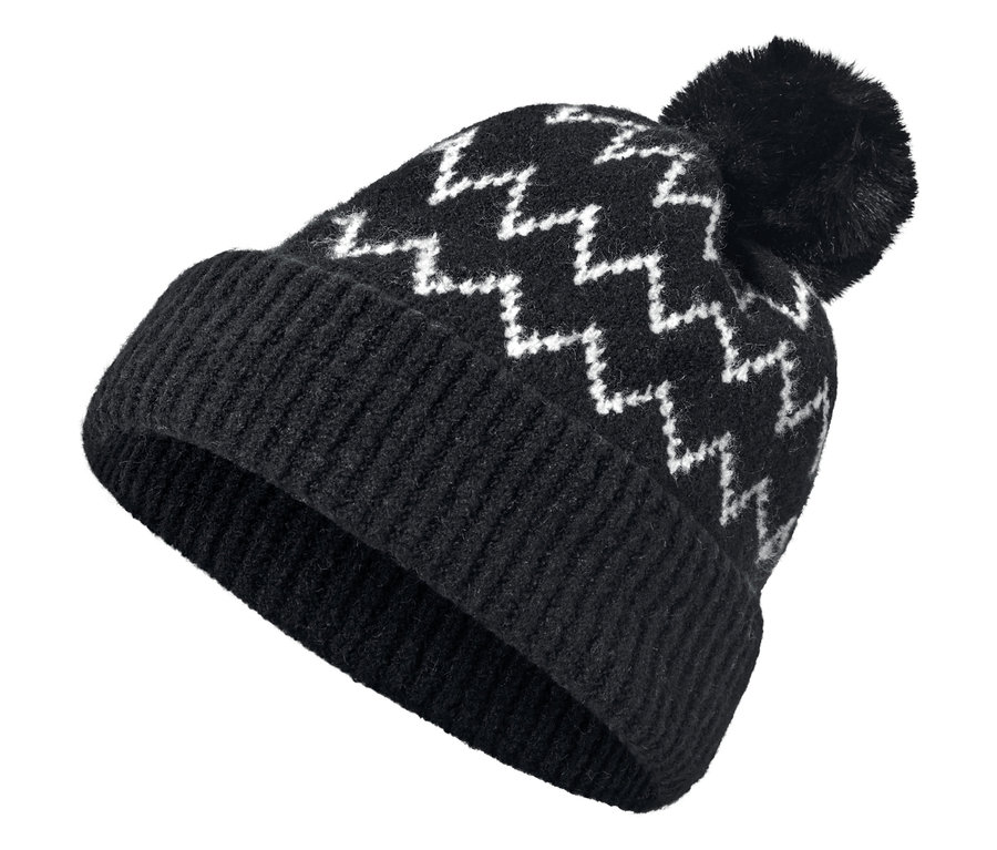 Eine schwarze Strickmütze mit Zickzackmuster und Bommel.