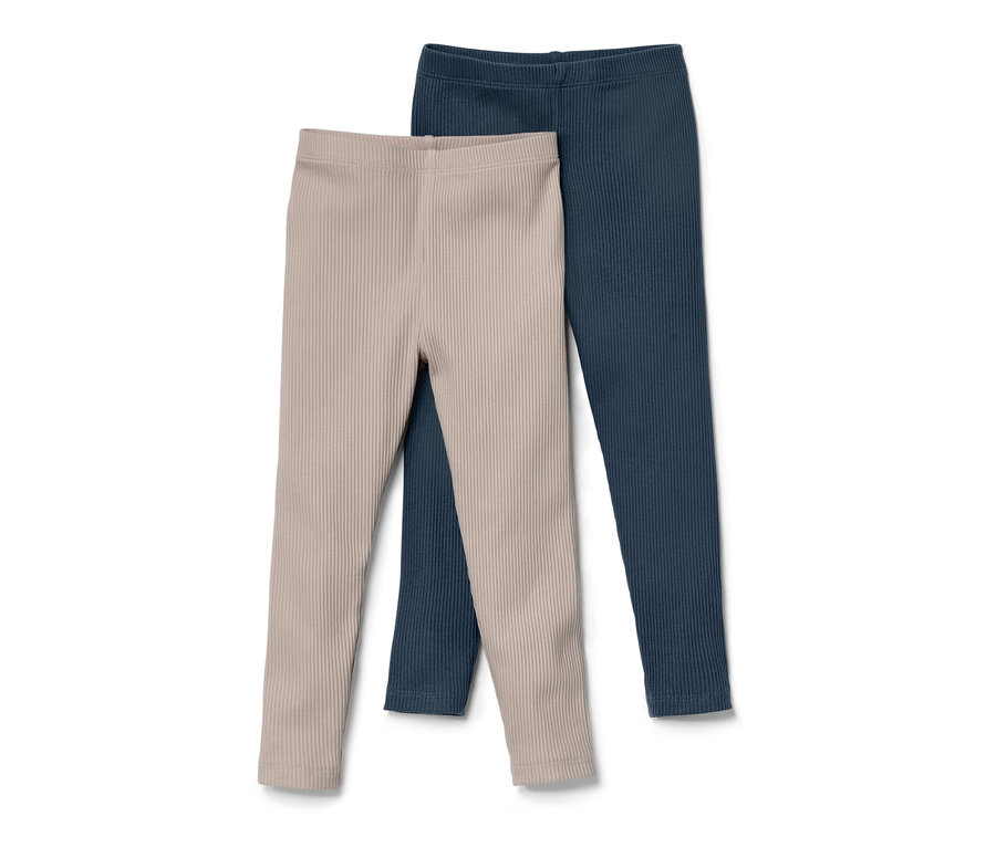Zwei Kinder-Rippleggings, eine beige und eine dunkelblaue.